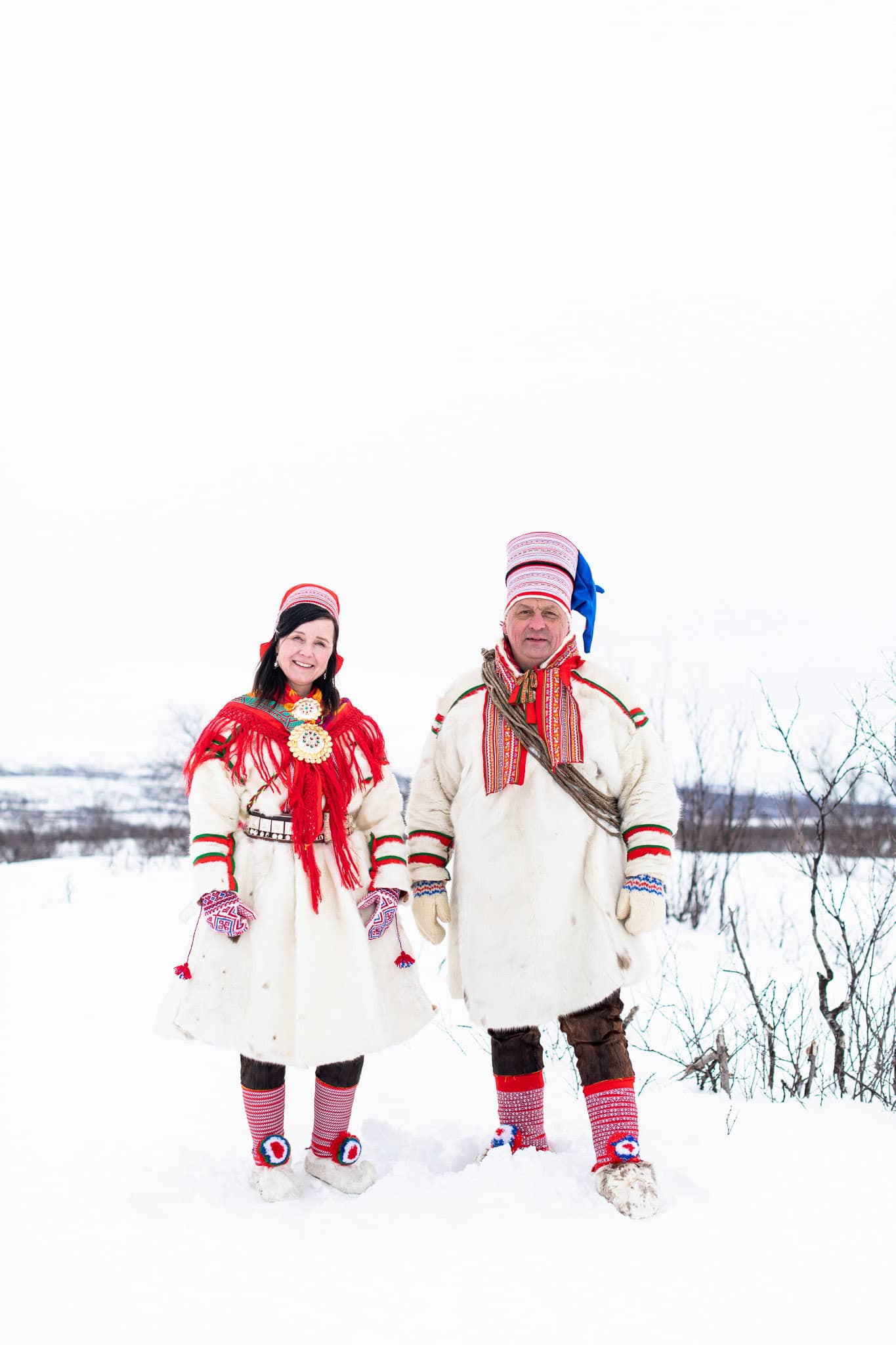 Traditional Sami clothing in a snowy landscape, celebrating Sami culture and heritage.